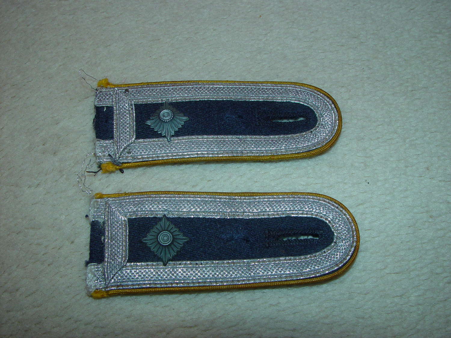 A pair of Luftwaffe sew-in yellow piped NCO's shoulder straps