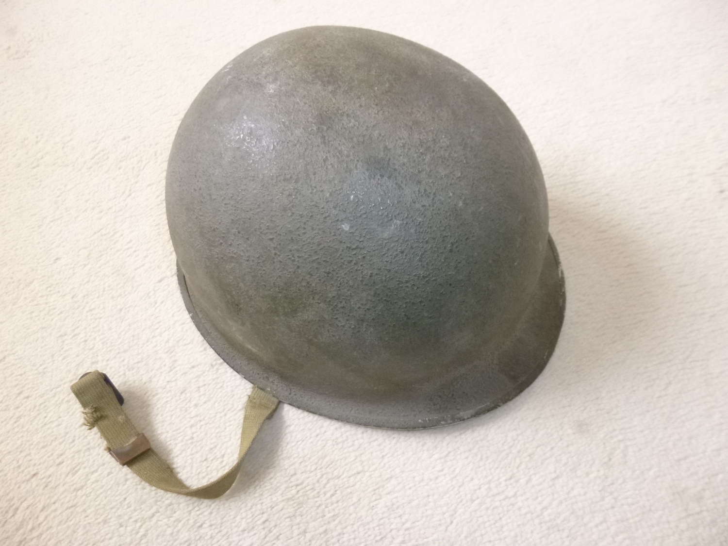 Early US M1 fixed bale helment with fibre Hawley liner